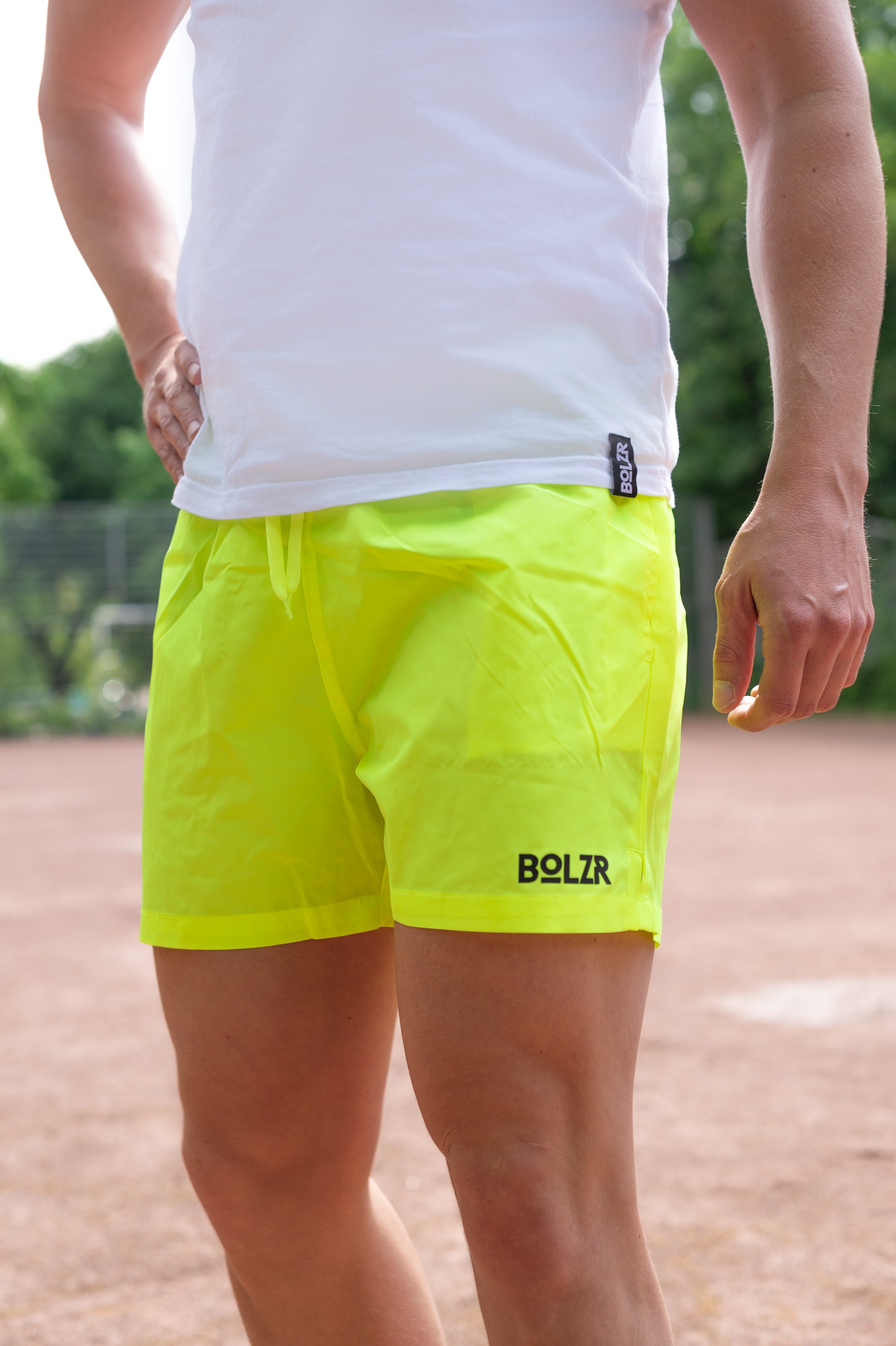 Bolzr swim shorts | outdoor pool | Neon yellow