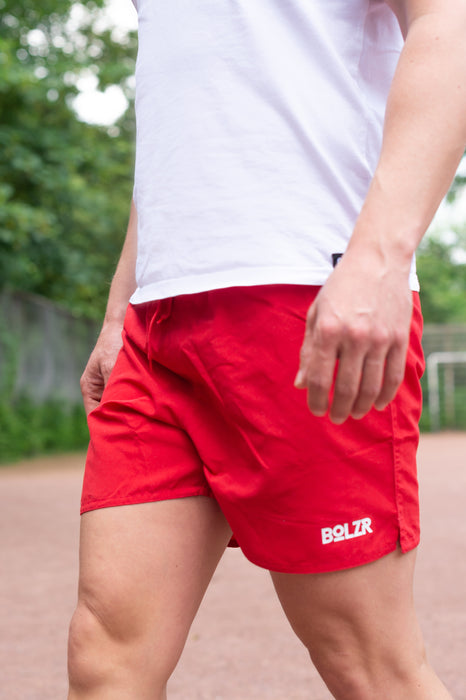 Bolzr swim shorts | outdoor pool | Red